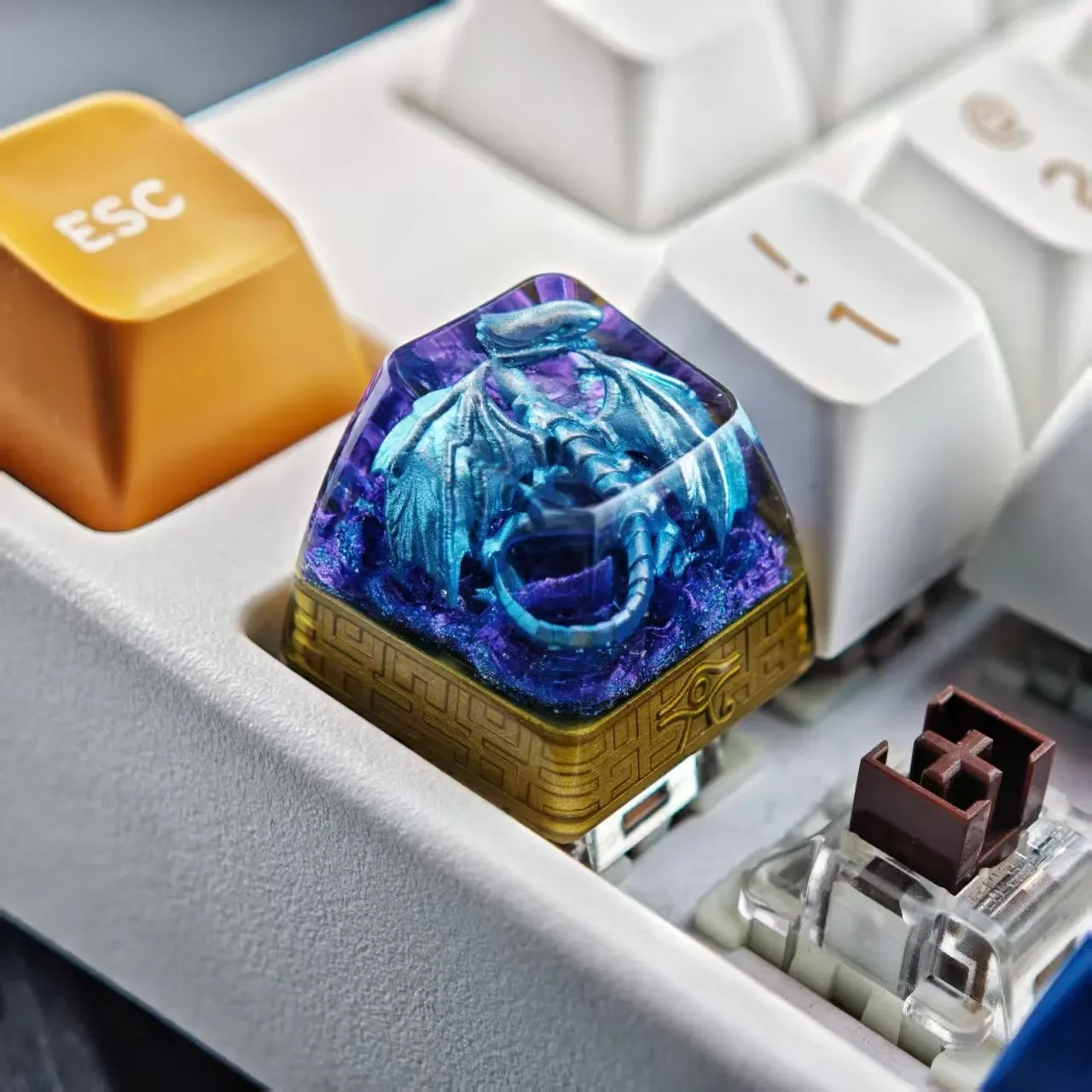 Iconic Blue-Eyes White Dragon translucent resin keycap. Intricate, vibrant translucent dragon from all angles for gaming immersion.
