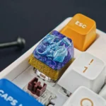 Gallery views of the iconic Blue-Eyes White Dragon translucent resin keycap. Intricate mythical dragon, vibrant glow, artistic design for gaming.