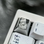 Bocchi the Rock!: Hitori Gotoh Titanium Keycap with intricate pointillism anime art. Polished silver finish highlights the premium Bocchi Keycap.