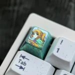 Gallery of the exclusive Bocchi the Rock titanium keycap, displaying its vibrant anime character art and premium ice crystal green finish.