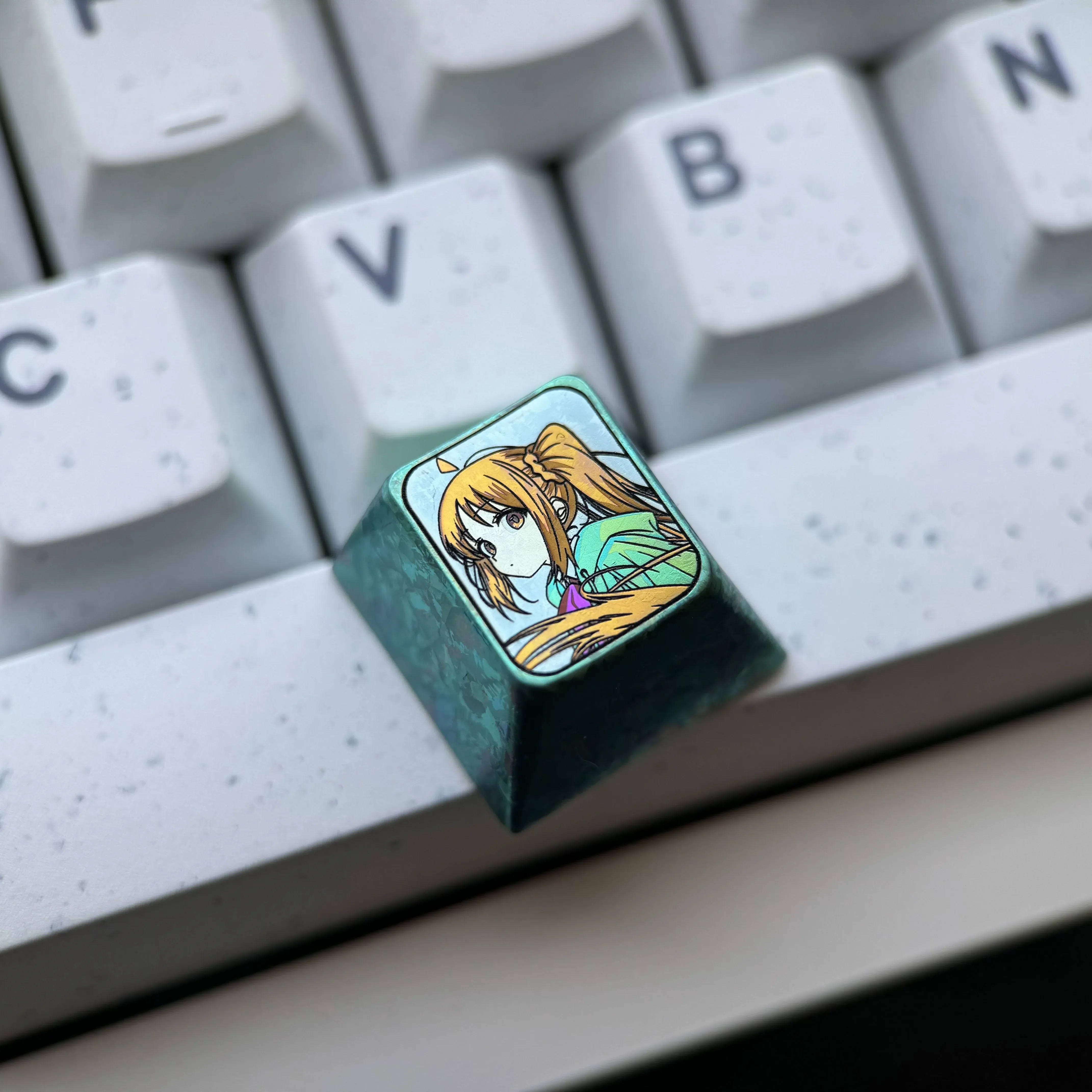 Gallery of the exclusive Bocchi the Rock Titanium Keycap, showcasing its vibrant anime character art and premium ice crystal green titanium finish.