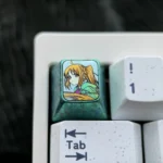 Exclusive Bocchi the Rock Titanium Keycap showcasing vibrant anime character art and a premium ice crystal green finish. Essential for niche design.