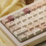 Luxurious Caramel Keycap Set, for custom mechanical keyboards, offers a cozy winter aesthetic in warm caramel, cream, and browns.