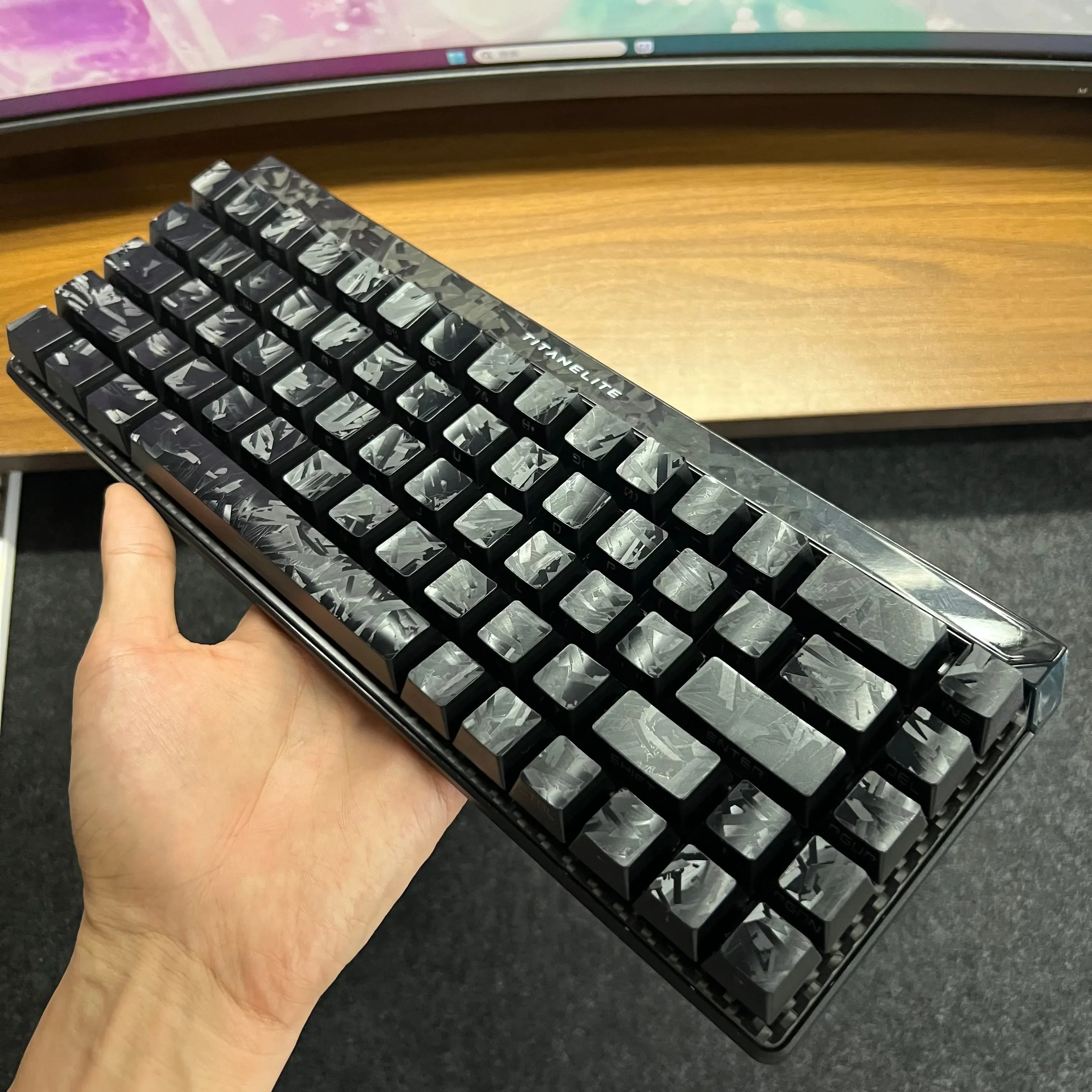 Detailed views of premium Forged Black Carbon Fiber Side-Print Keycap Set, revealing the intricate matte texture and crisp legends from multiple angles.