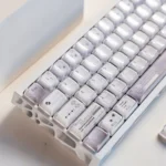 Gallery of Coconut Latte Keycaps Set. Durable dye-sub PBT mechanical keycap set in refreshing soft creams, warm browns, and subtle greens.