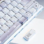 Coconut Latte Keycaps Set gallery: Durable dye-sub PBT in soft creams, warm browns, and subtle greens. Artistic display from refreshing angles.