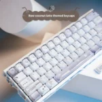 Multiple views of durable dye-sub PBT Coconut Latte Keycaps Set. Soft creams, warm browns, and subtle greens create a cozy, refreshing theme.