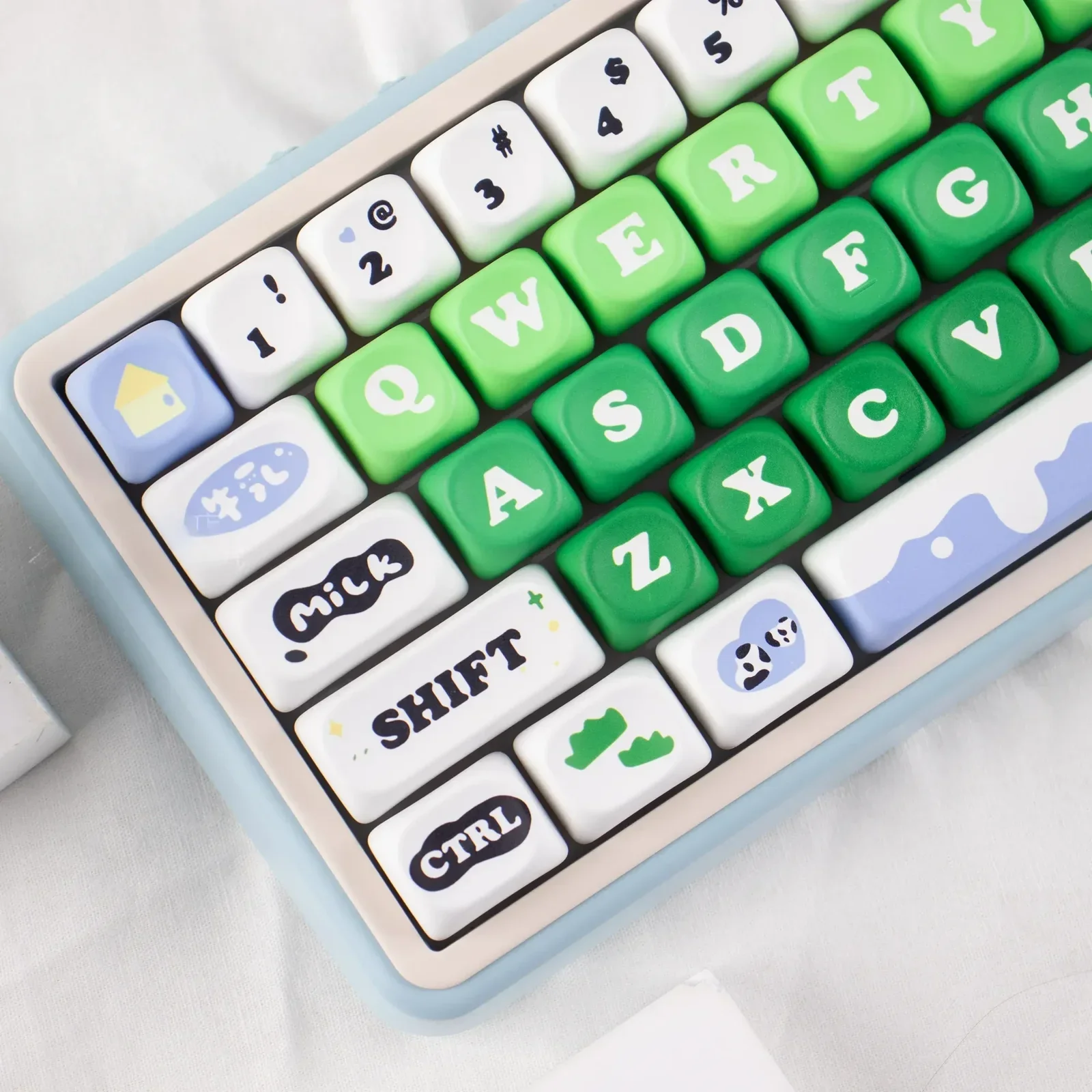 Multiple angles of the Whimsical Cow Farm Dye-Sub PBT keycaps Set, revealing adorable cow patterns and the unique custom mechanical setup.
