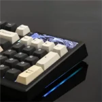 A gallery view of the YZ98 Tri-Mode Hot-Swappable Custom Mechanical Keyboard, showcasing its elegant grey-white design and vibrant RGB lighting from