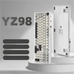 A YZ98 Tri-Mode Hot-Swappable Custom Mechanical Keyboard showcasing its elegant grey-white design, illuminated by vibrant RGB backlighting, for