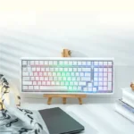 Double-Skin Milk Base99 Tri-Mode Mechanical Keyboard with soft, translucent double-layer jelly keycaps in creamy pastel tones.