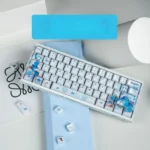 Dreamy blue fantasy Keycaps Set for mechanical keyboards, featuring vibrant dye-sublimated ethereal characters and celestial motifs.