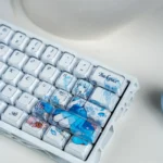 Dreamy Blue Fantasy MDA Keycap Set, displayed from various angles, highlighting vibrant dye-sublimation of ethereal characters and celestial design.