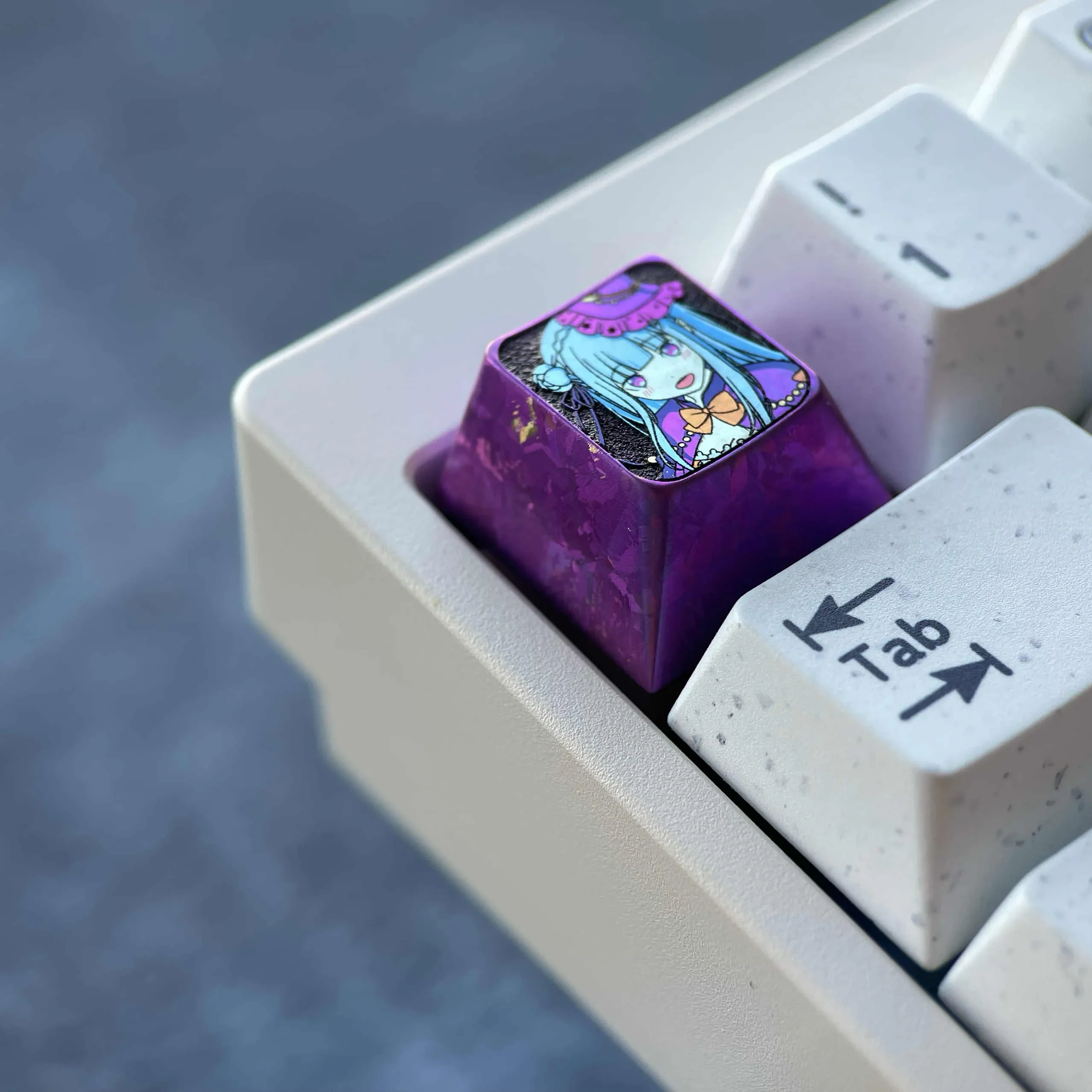 Emilia Titanium Keycap collection: premium artisan Halloween custom metal keycap with anodized purple, anime-inspired mystical design.
