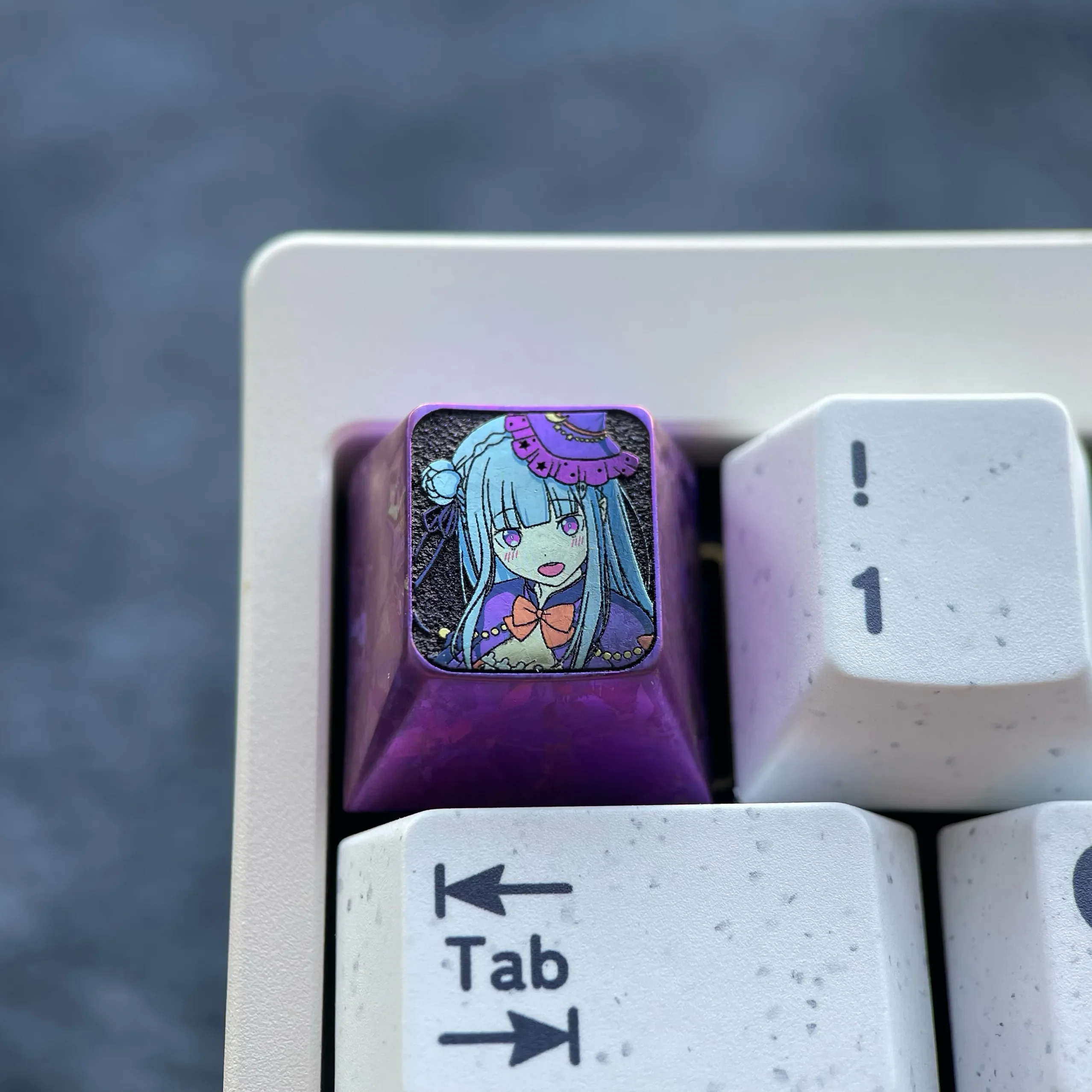 Emilia Titanium Keycap: Premium artisan custom metal keycap featuring an anime-inspired Emilia design with mystical Halloween elements in anodized design.
