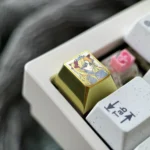 Premium Ereshkigal Keycap of lustrous titanium alloy, showcasing intricate Ereshkigal motifs. Vibrant, iridescent colors emphasize its custom quality.