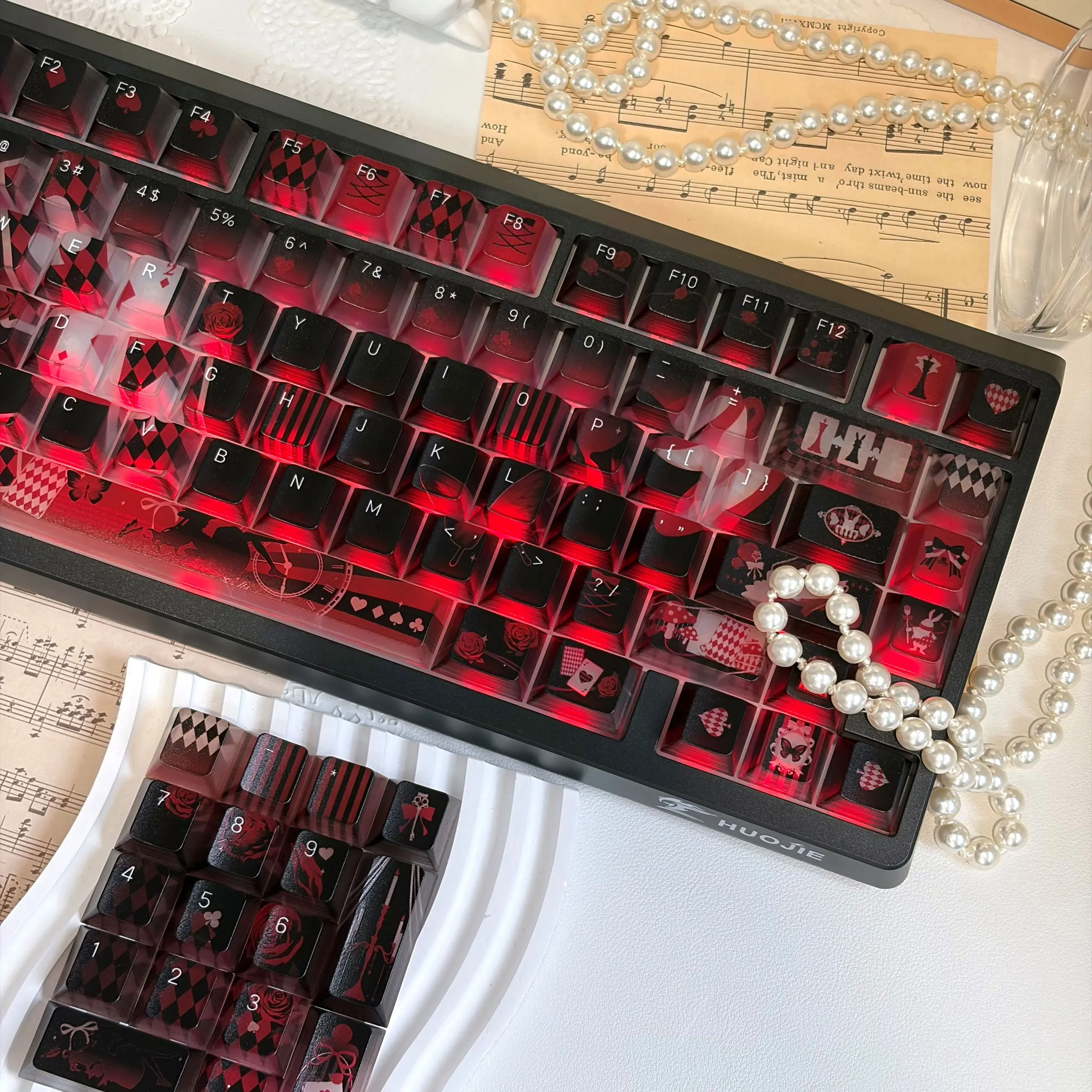 Lost Alice Keycap Set Ethereal translucent PC set for mechanical keyboards, showcasing whimsical frosted designs from multiple angles with ambient glow.