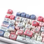 Nostalgic PBT Keycaps set featuring gentle, creamy pastel colors and a sweet dye-sub First Love aesthetic, evoking innocence and soft charm.
