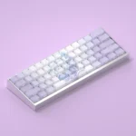 Multiple views of the exclusive Frieren side-lit keycaps set, showcasing the elegant anime art and luminous side-engraved legends.