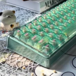 Guava Tri-Mode Custom Mechanical Keyboard, highlighting its vibrant aesthetic and with varous of switches selection.