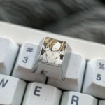 Legendary hand-carved titanium Goku keycap, an exquisite anime art piece showcasing iconic Dragon Ball details.
