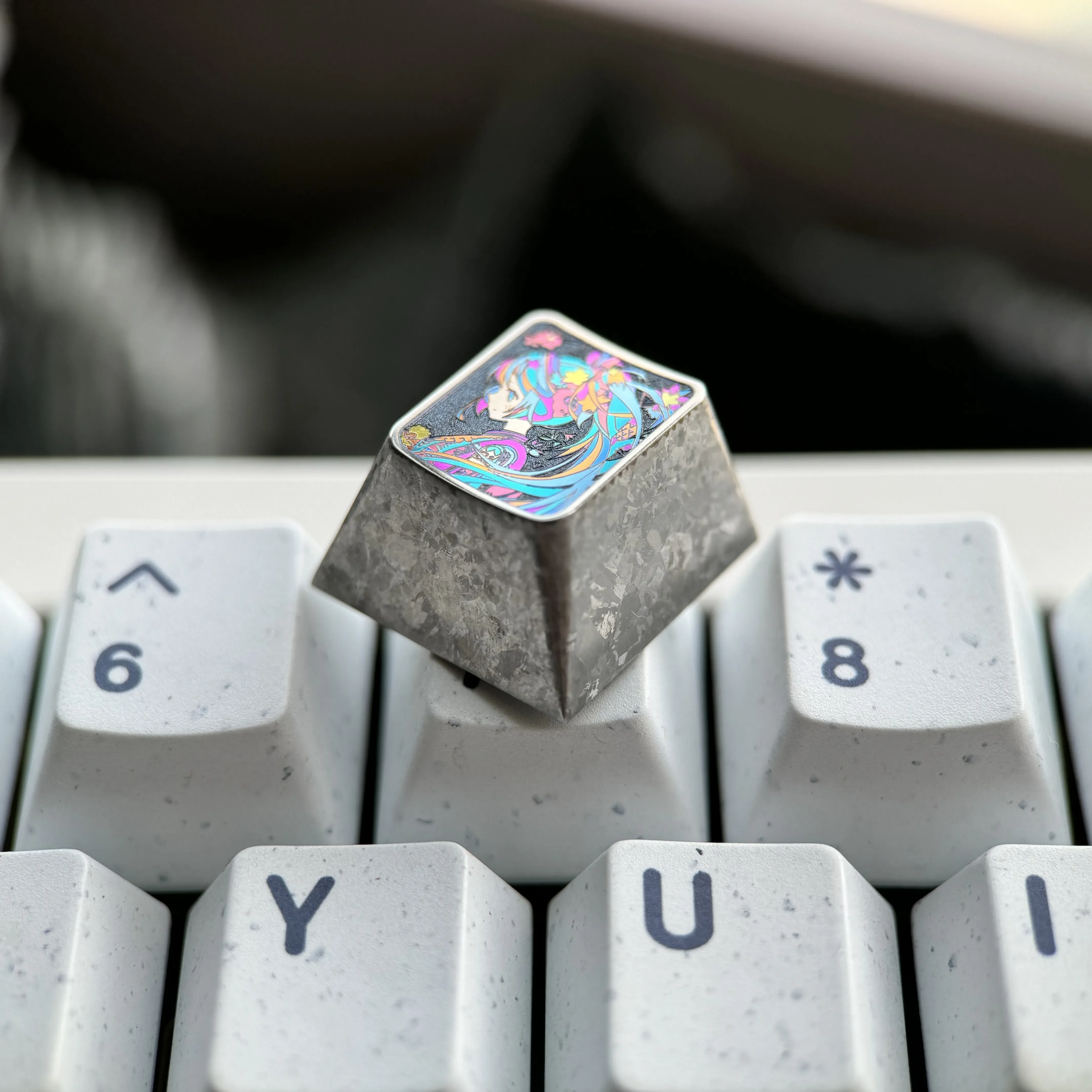 This collection of Hatsune Miku Titanium Keycaps highlights the exclusive ice crystal silver finish and premium craftsmanship for mechanical keyboard.