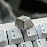 Exclusive Hatsune Miku Titanium Keycap gallery reveals its sleek metallic design and shimmering ice crystal silver elegance for mechanical keyboards.