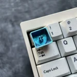 Official Hatsune Miku Heart Titanium Artisan Keycap from various angles, showcasing its vibrant iconic design and polished colorful metal finish.