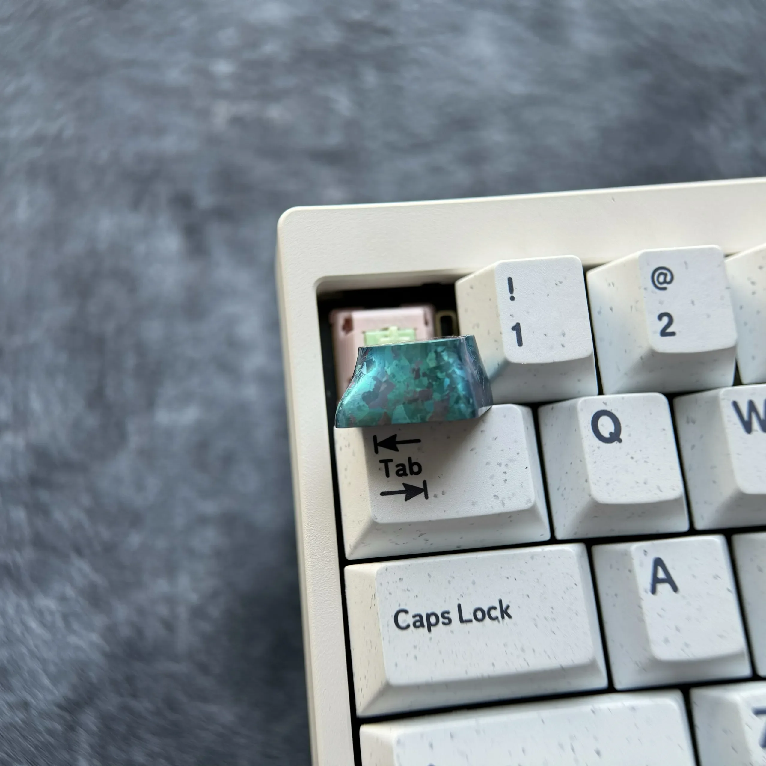 Multiple views of the Official Hatsune Miku Heart Keycap, a vibrant titanium artisan keycap with iconic design and premium finish.