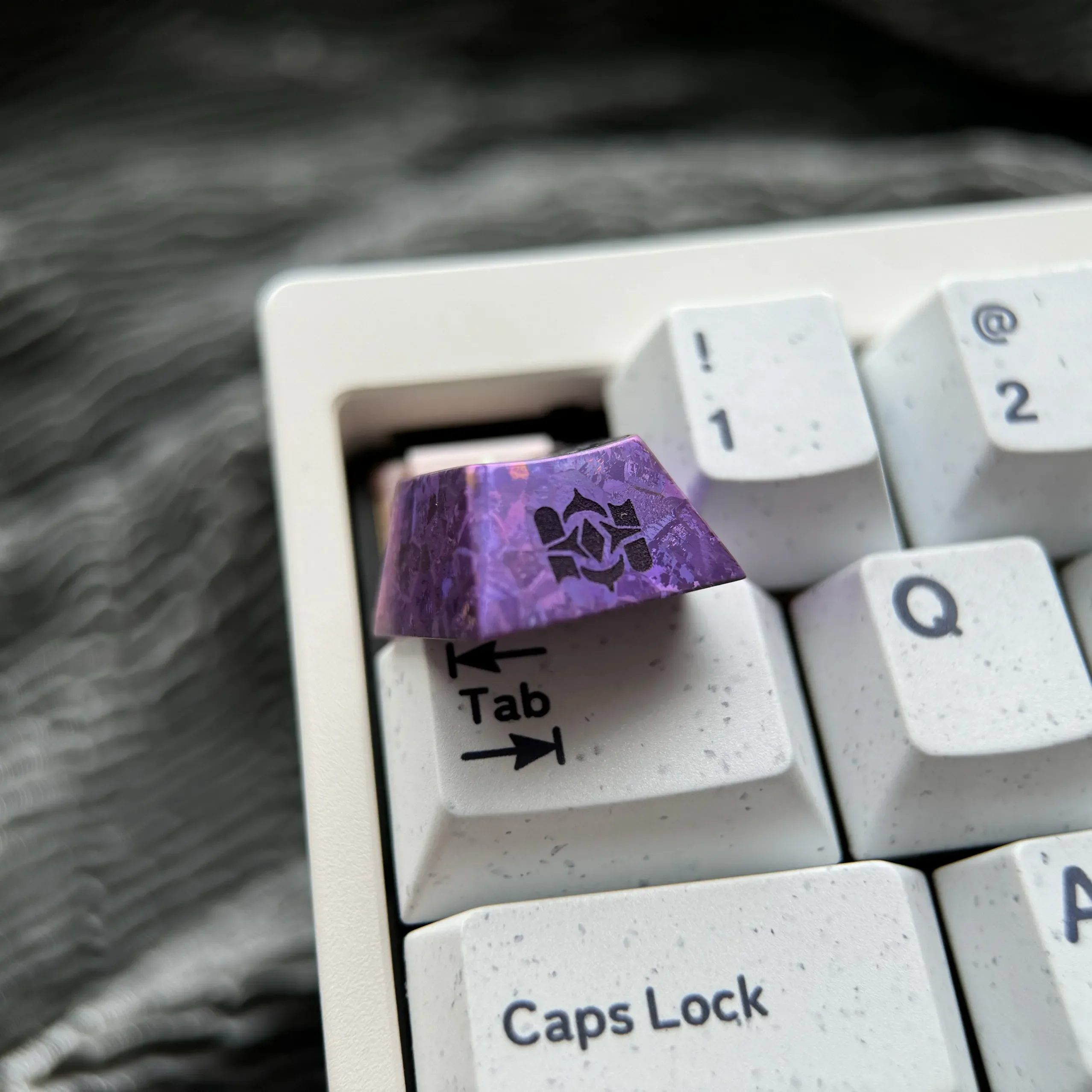 Gallery showcasing the premium Herta Ice Crystal Purple Anodized Titanium ESC Keycap, revealing its luminous celestial finish from various angles.