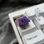 Gallery of Herta Ice Crystal Purple Anodized Titanium ESC Keycap, showcasing its premium alloy and luminous celestial hues from multiple angles.