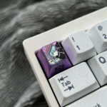Stunning Herta Ice Crystal Purple Anodized Titanium ESC keycap, radiating celestial luminosity on a durable premium titanium alloy.