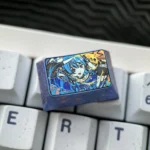 Various views of the premium Hoshimachi Suisei titanium keycap, highlighting its intricate ice crystal VTuber art and radiant finish.