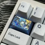 A gallery of the exclusive Hoshimachi Suisei titanium keycap, showcasing its stunning ice crystal design and vibrant luster from multiple artistic design.