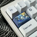 Views of the exclusive Hoshimachi Suisei titanium keycap, an icy crystal VTuber art piece with vibrant titanium luster.