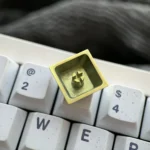 Vibrant Titanium Ishtar Artisan Keycap showcasing intricate celestial anime goddess details from multiple angles. Highlights premium finish.