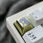 Stunning main display of a collectible Ishtar keycap crafted from vibrant titanium, featuring the celestial anime goddess with intricate details.
