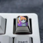 Collectible vibrant titanium Kanna Kamui ESC keycap, brilliantly showcasing playful Dragon Maid anime art with a metallic purple gleam.