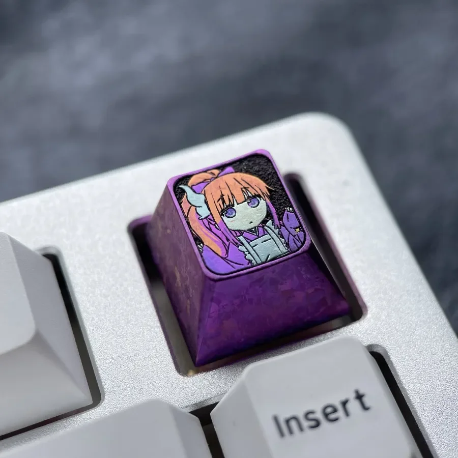 Kanna Kamui Keycap gallery shows vibrant titanium ESC keycaps metallic purple finish and playful Dragon Maid character art.
