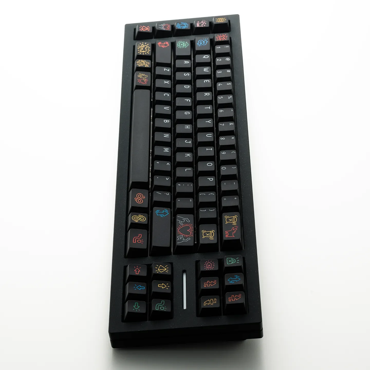 Collection of iconic Keith Haring Graffiti PBT Keycaps Set, showcasing dynamic urban art from multiple angles, emphasizing premium durability.