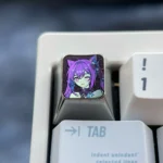 Multiple views of the premium anodized titanium Keqing keycap, showcasing its luminous ice crystal purple finish and electro-inspired Genshin Impact.
