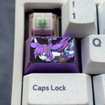 Multiple views of the premium Keqing titanium alloy keycap, showcasing its sleek metallic purple and refined Genshin Impact design.