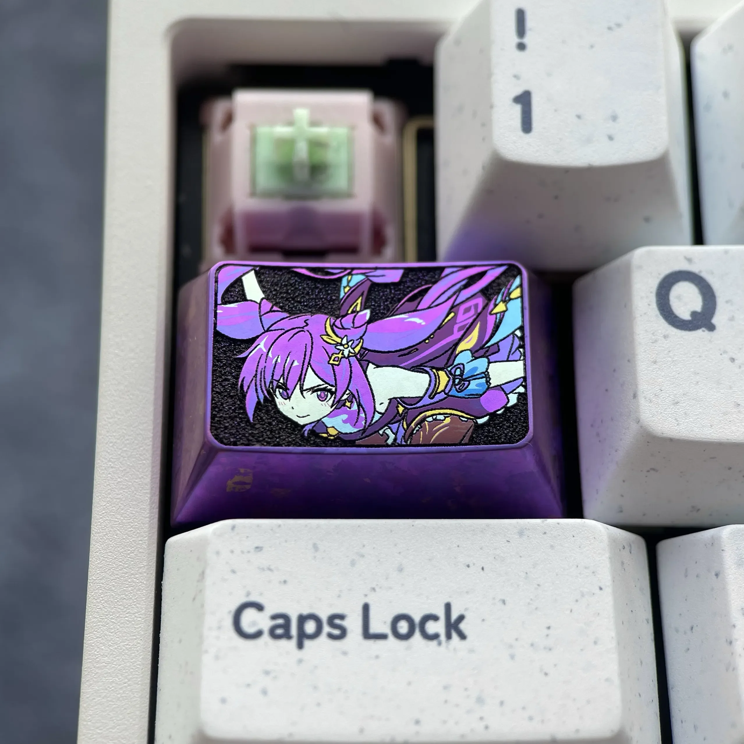 Multiple views of the premium Keqing titanium alloy keycap, showcasing its sleek metallic purple and refined Genshin Impact design.