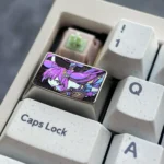 Premium Keqing titanium alloy keycap from multiple angles, showcasing its sleek metallic purple finish and intricate Genshin Impact design details.
