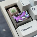 Exclusive Keqing titanium alloy keycap, showcasing its sleek metallic purple finish and detailed Genshin Impact aesthetic, a premium custom metal design.