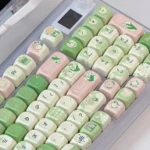 Multiple views of the exquisite Lily of the Valley keycaps set, highlighting dreamy floral patterns and rounded XOA profile for custom keyboards.