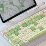 Lily of the Valley keycaps set gallery. Exquisite floral designs, soft pastels, unique rounded XOA profile showcased from various artistic views.