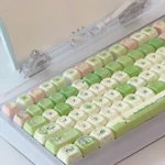 Multiple views of the exquisite Lily of the Valley keycap Set, showcasing their dreamy floral design, soft pastels, and unique XOA profile for custom