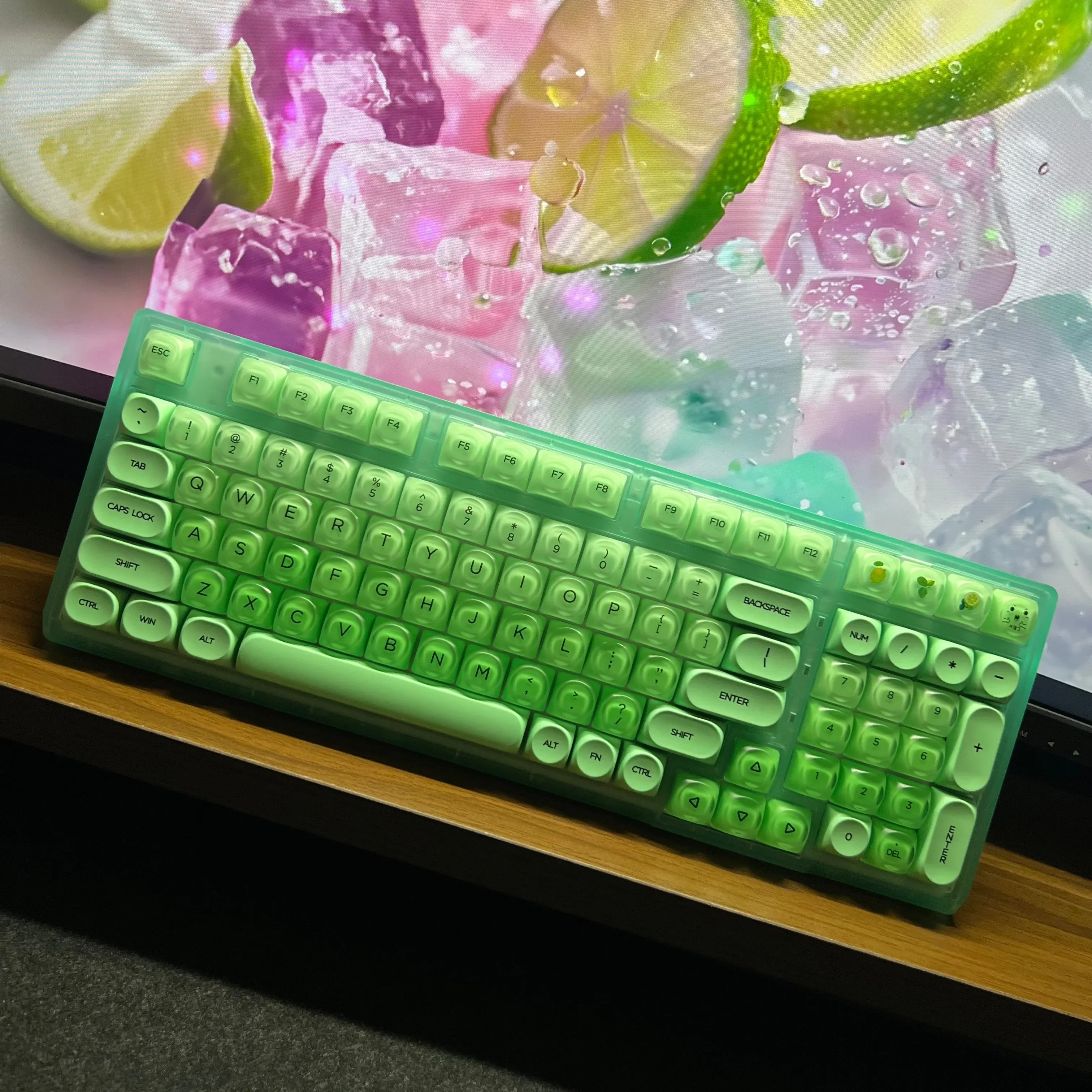 Vibrant lime green 98-key tri-mode mechanical keyboard shown from multiple dynamic angles, highlighting hot-swappable switches.