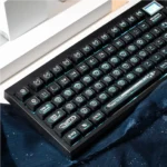 Luminous Black Cherry Keycap Set. See mesmerizing cat's eye legends from various angles, showcasing sleek design and enchanting backlit design.